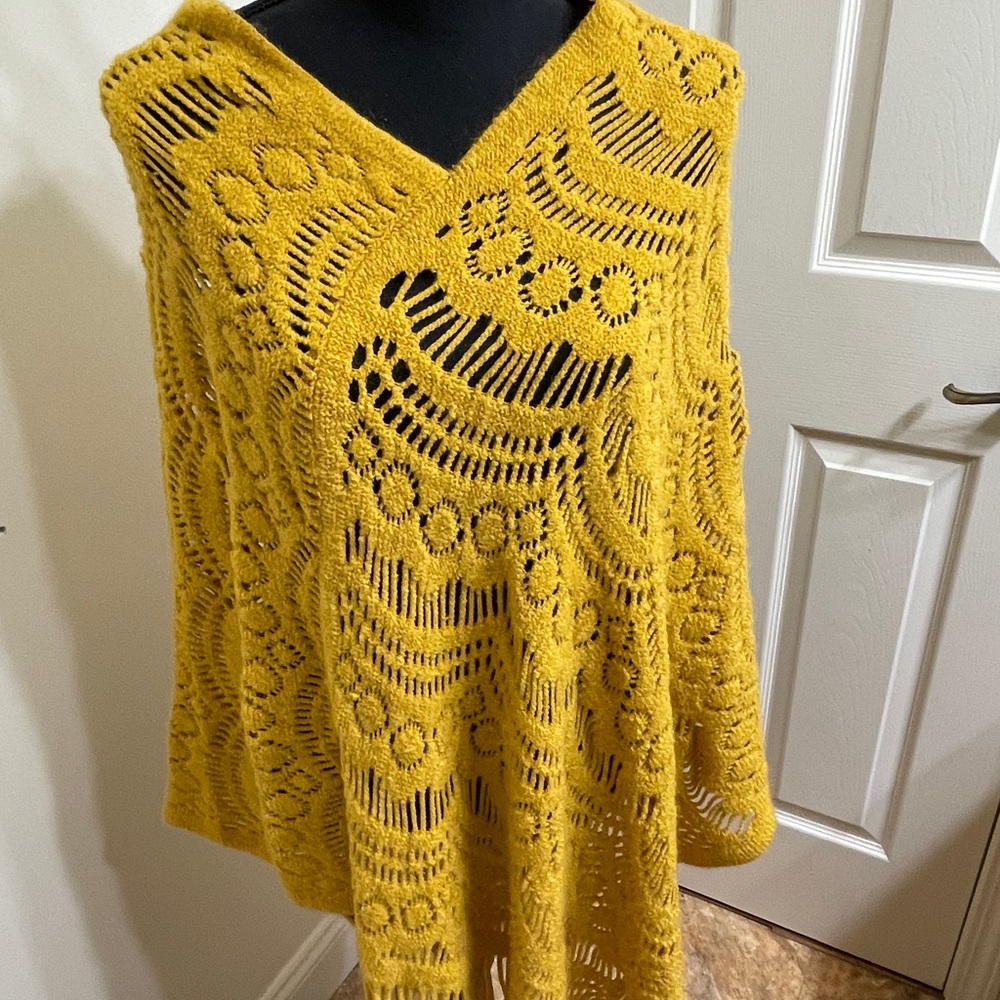 Large knitted pancho sweater